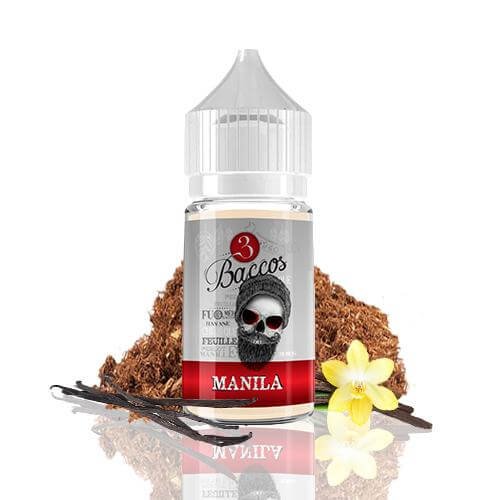 E-liquid vape bottle with skull logo on a label, resting on a mound of tobacco with a yellow vanilla flower nearby.